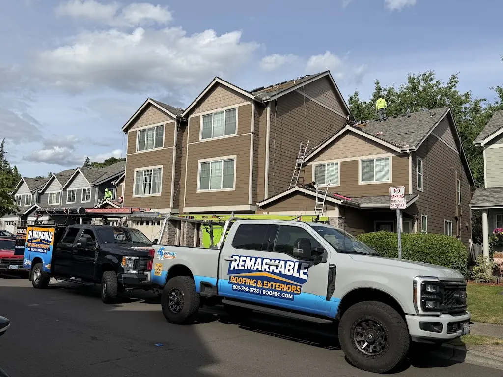 Remarkable Roofing trucks at an active residential roofing project